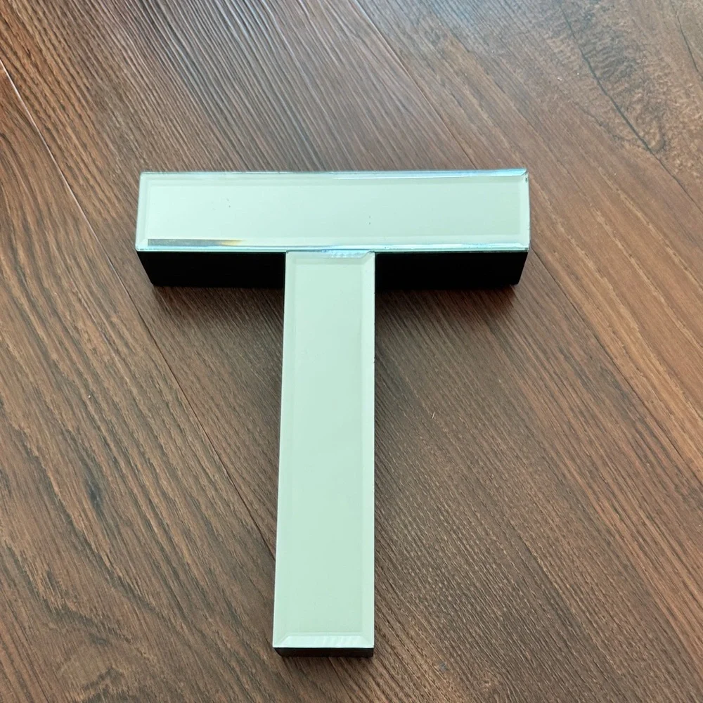 Mirror Letter T Size OS Color Black